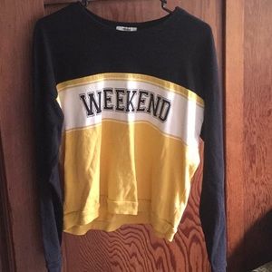Yellow and black striped “Weekend” shirt.